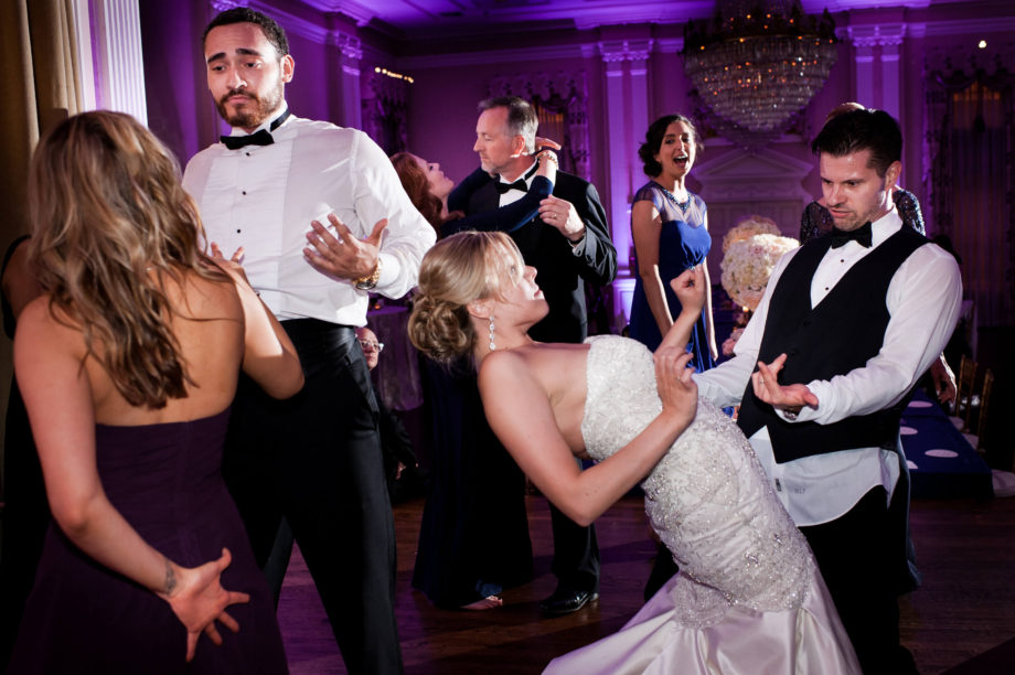 bride groom guests dancing wedding reception