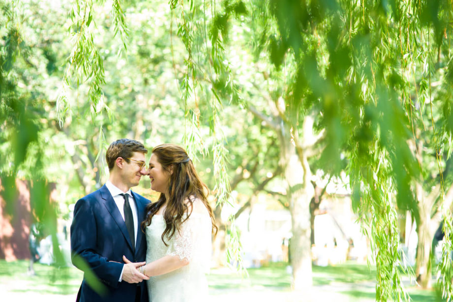 groom bride noses weeping willow daylight portrait