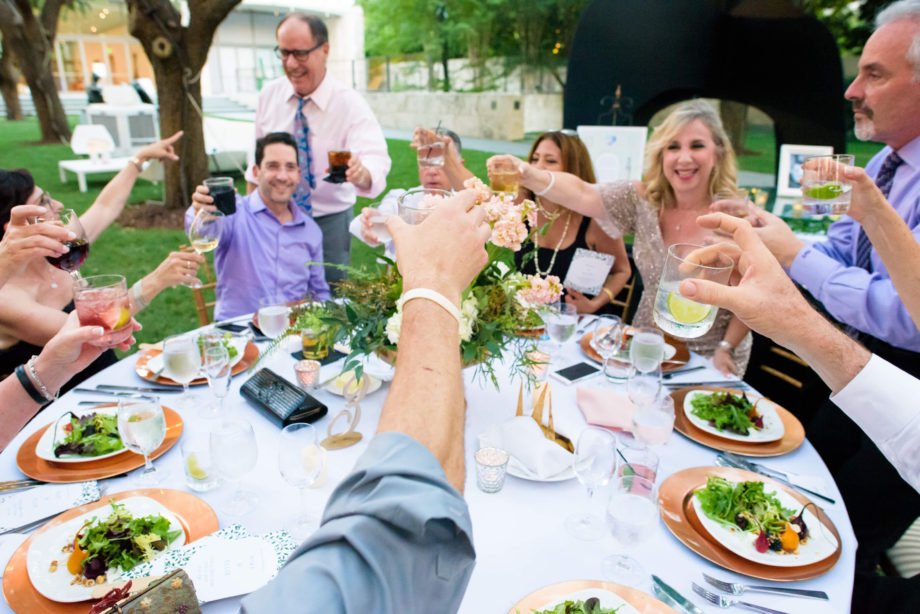 cheers toasting wedding guests dinner table reception Nasher Sculpture Center Dallas