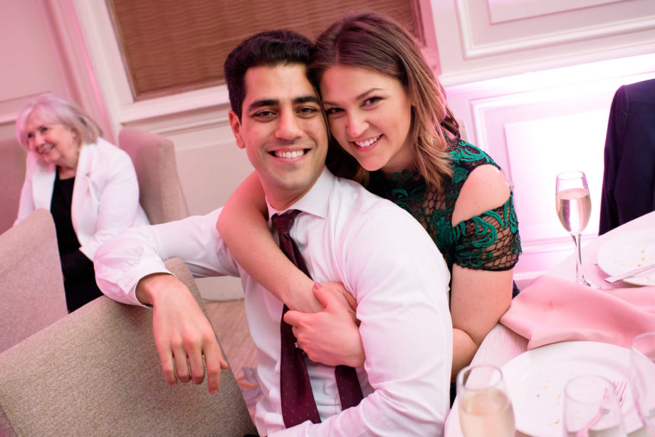 cozy sweet loving couple embraces wedding guests Crescent Court Hotel Dallas