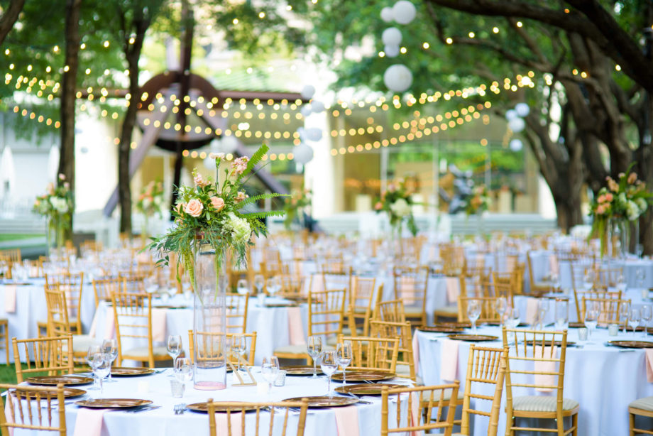 outdoor garden wedding tables floral centerpieces cafe lights Nasher Sculpture Center Dallas