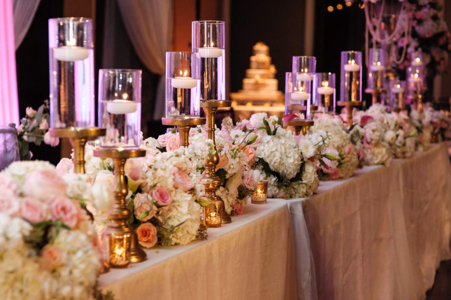 long table setup candles floral wedding cake details